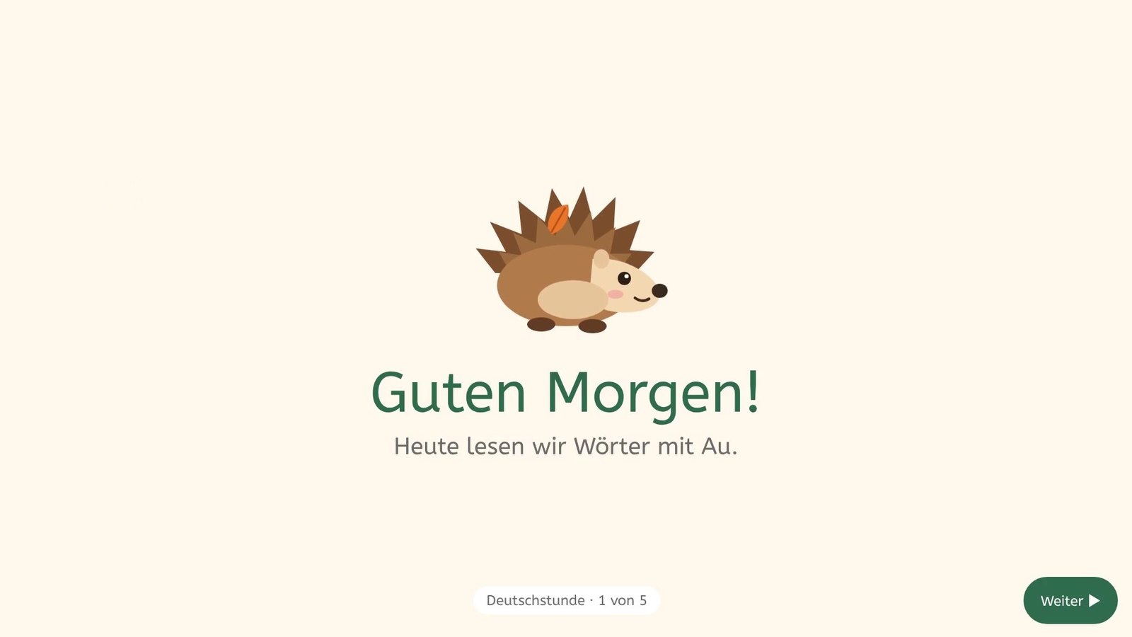 Stundenmodus: Igel Ida begrüßt mit „Guten Morgen! Heute lesen wir Wörter mit Au.“, unten der Knopf „Weiter“